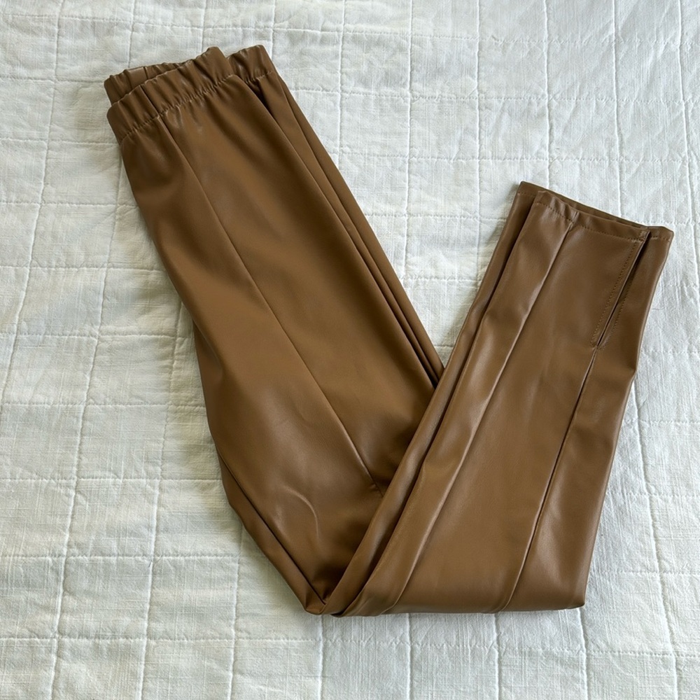 Brown Leather Leggings. Ankle slit. Never worn.